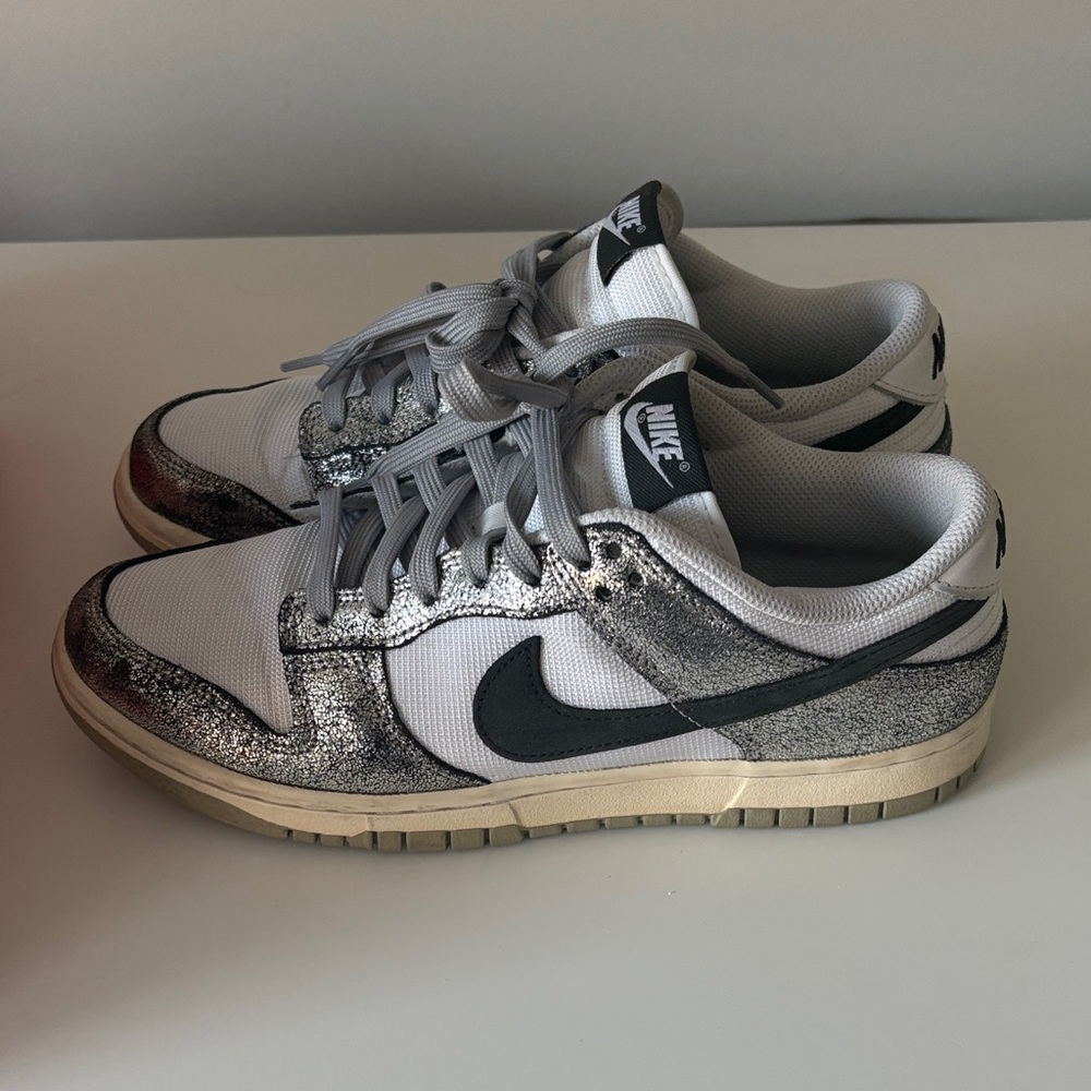 Nike Women’s White and Silver Dunks. Size 9